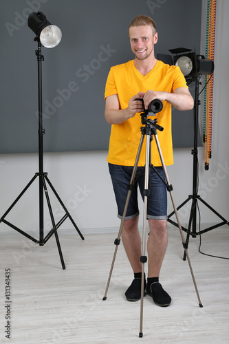 Handsome photographer with ...