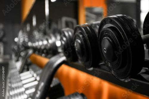 Closeup of dumbbells in gym