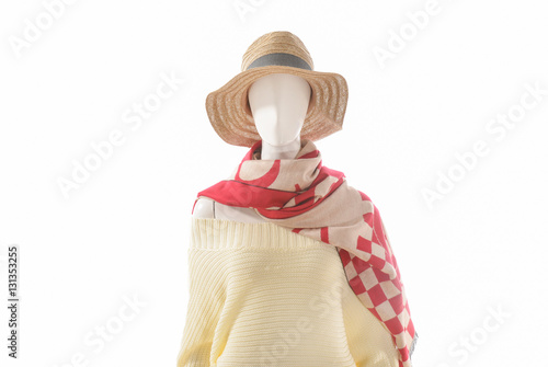 women dress with hat, scarf on dummy 