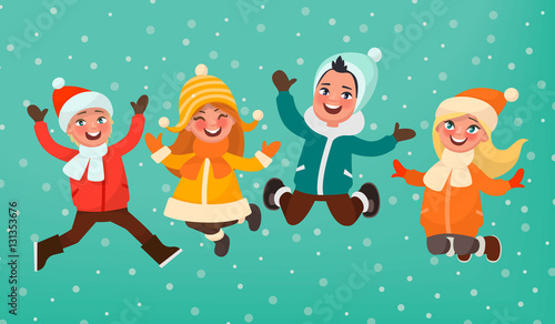 Winter children's games. Boys and girls dressed warmly are jumpi