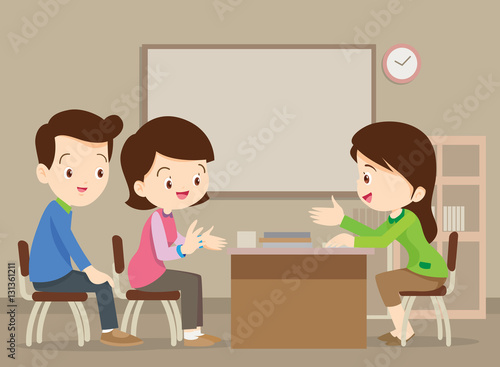 family talking with teacher