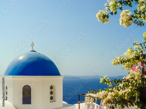 Blue dome of St. Nicholas church in Oia Santorini © vbjunior