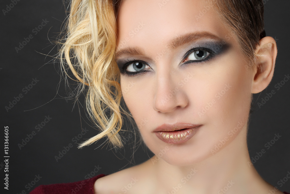 Portrait of a beautiful girl on a black background Portrait of a beautiful girl on a black background