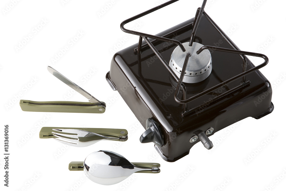 Set for the tourist. A spoon, a fork, a knife and portable gas stove on a white background Set for the tourist. A spoon, a fork, a knife and portable gas stove on a white background