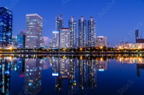 Bangkok's cityscape at night,looking across the lake at Queen Sirikit National Convention Center.
