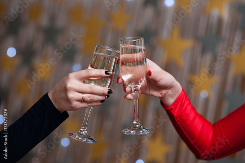 Celebration. People holding glasses of champagne making a toast