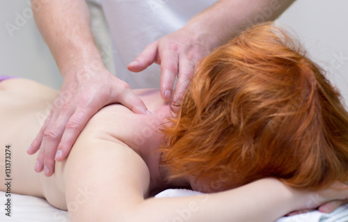Woman doing massage from a massage therapist