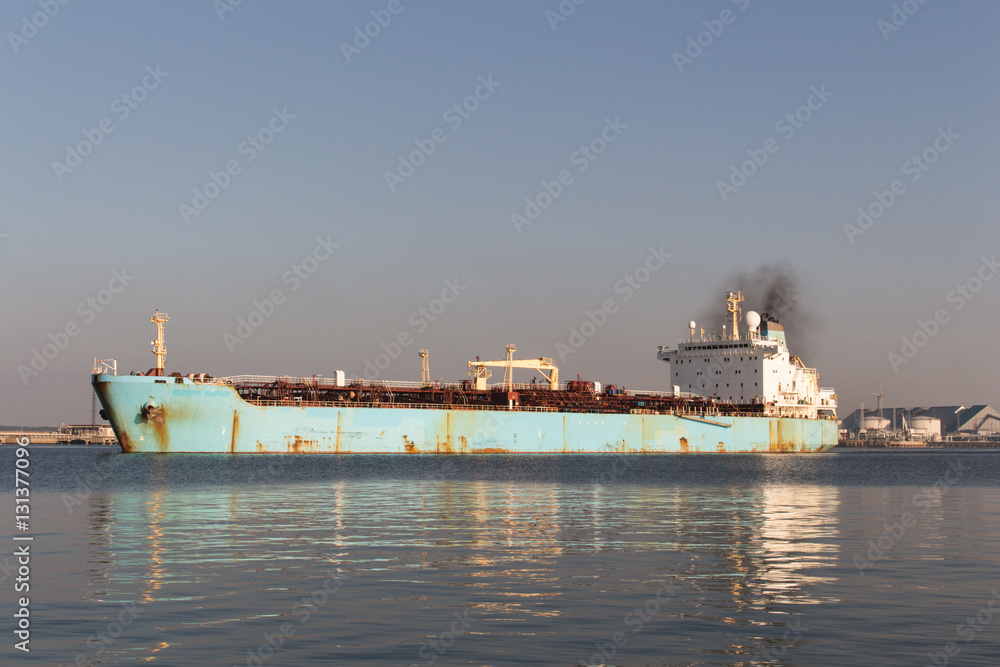 Chemical Vessel leaving the port in clear weather