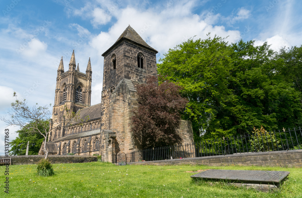 The Old tower built in the 13th Century still standing in front of the present St Mary's Church in Mirfield, West Yorkshire, England.