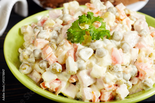 Olivier salad with boiled vegetables. Traditional Russian cuisine.
