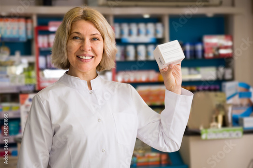 Portrait of female professional pharmacists photo