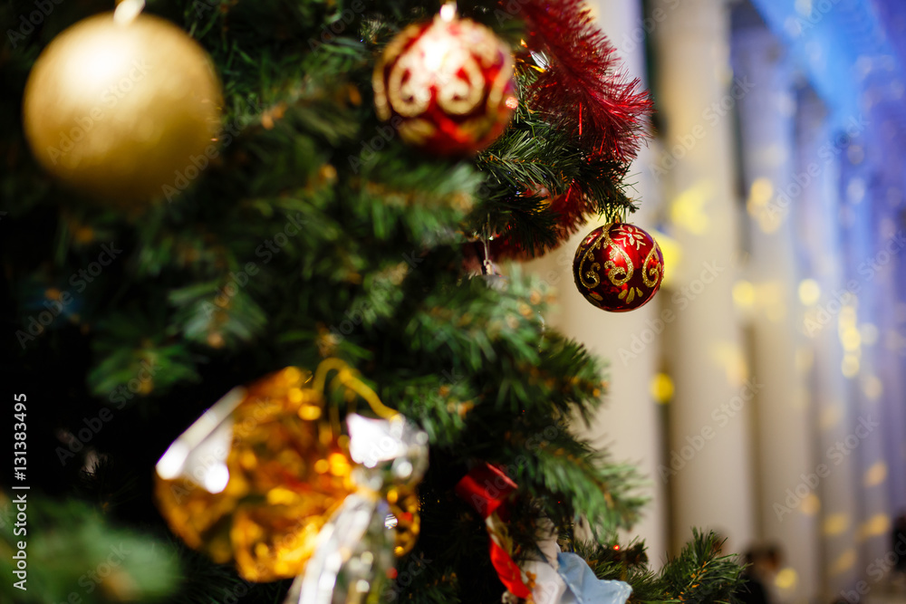 Christmas ornaments on a tree Christmas ornaments on a tree