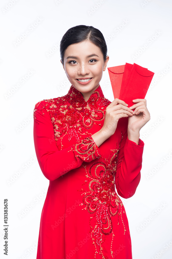 Portrait of a beautiful Asian woman on traditional festival Ao Dai.
