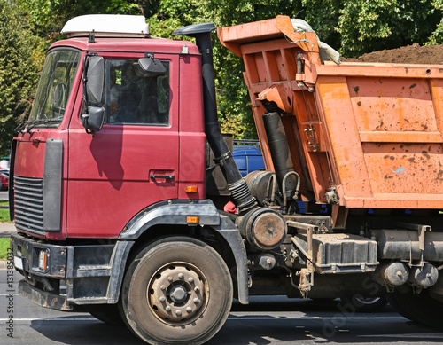 Dump truck transports earth