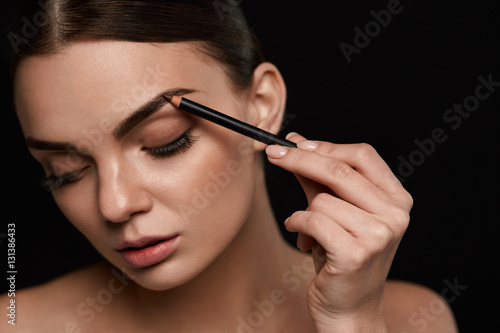 Eyebrows Contouring. Beautiful Woman With Brown Eyebrow Pencil
