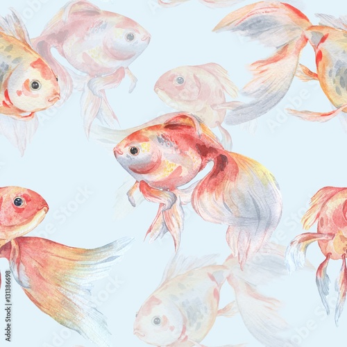 Seamless pattern with goldfish on a blue background. Watercolor painting. Handmade drawing. © shilovka