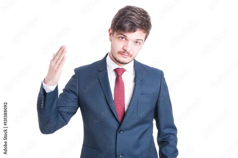 Business man standing with one hand raised Business man standing with one hand raised