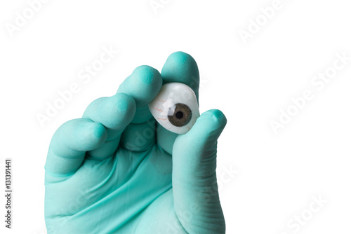 ocular prosthesis in the hands of the medic