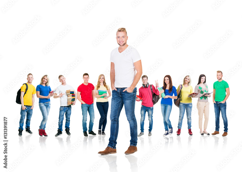 Fototapeta premium Large group of teenage students on white