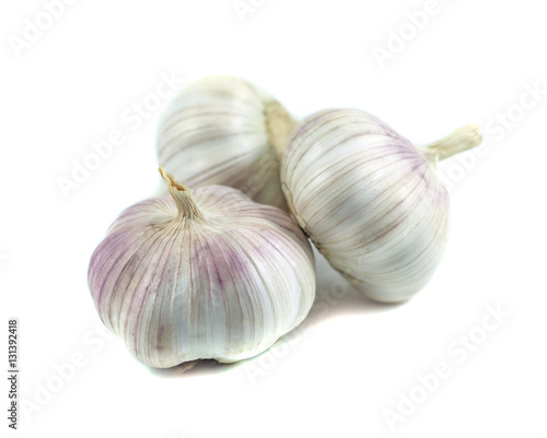 Three garlics isolated on white background