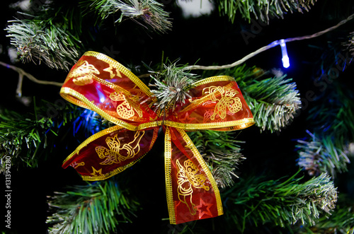 Christmas decoration on the tree © vladimirvu