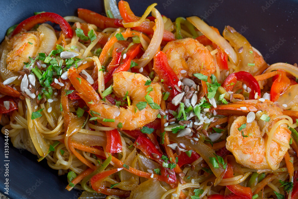 Close up of shrimp spaghetti with vegetables Close up of shrimp spaghetti with vegetables