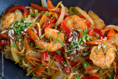 Close up of shrimp spaghetti with vegetables