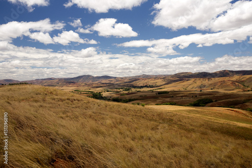 Beautiful sky over the wavy deforested landscape of northwest Madagascar