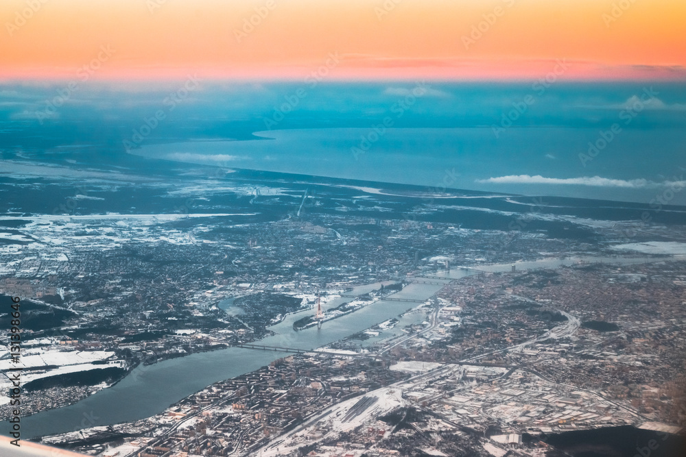 View From Airplane Window on Riga, Latvia. Sunset Sunrise Over Gulf Of Riga, Bay Of Riga