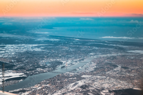View From Airplane Window on Riga, Latvia. Sunset Sunrise Over Gulf Of Riga, Bay Of Riga