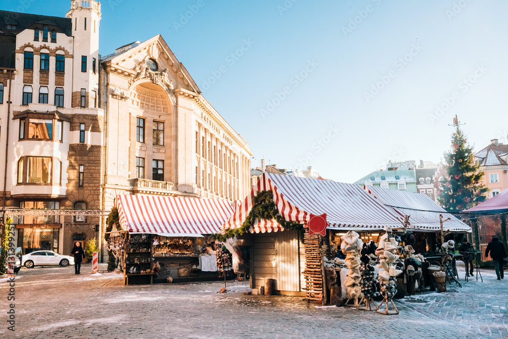 Christmas Market On Dome Square In Riga, Latvia. Trading Houses 