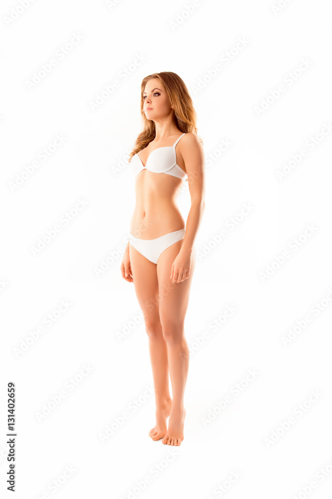 Slim fit woman in lingerie isolated on white background Slim fit woman in lingerie isolated on white background