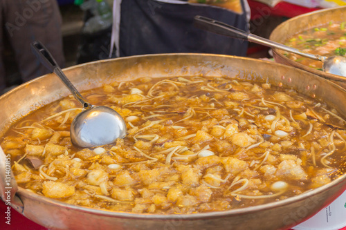 Chinese-styled Fish maw soup in a saucepan.