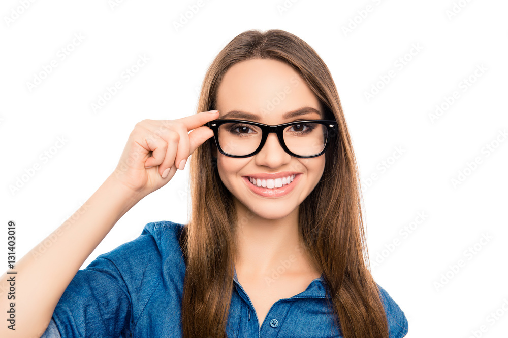 Portrait of pretty young happy secretary touching glasses Portrait of pretty young happy secretary touching glasses