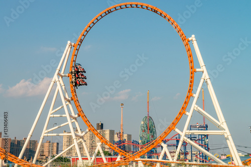 Roller coaster and buildings cityscape  on the Brighton Beach. It is known for its high population of Russian-speaking immigrants, and as a summer destination for New York City residents. photo