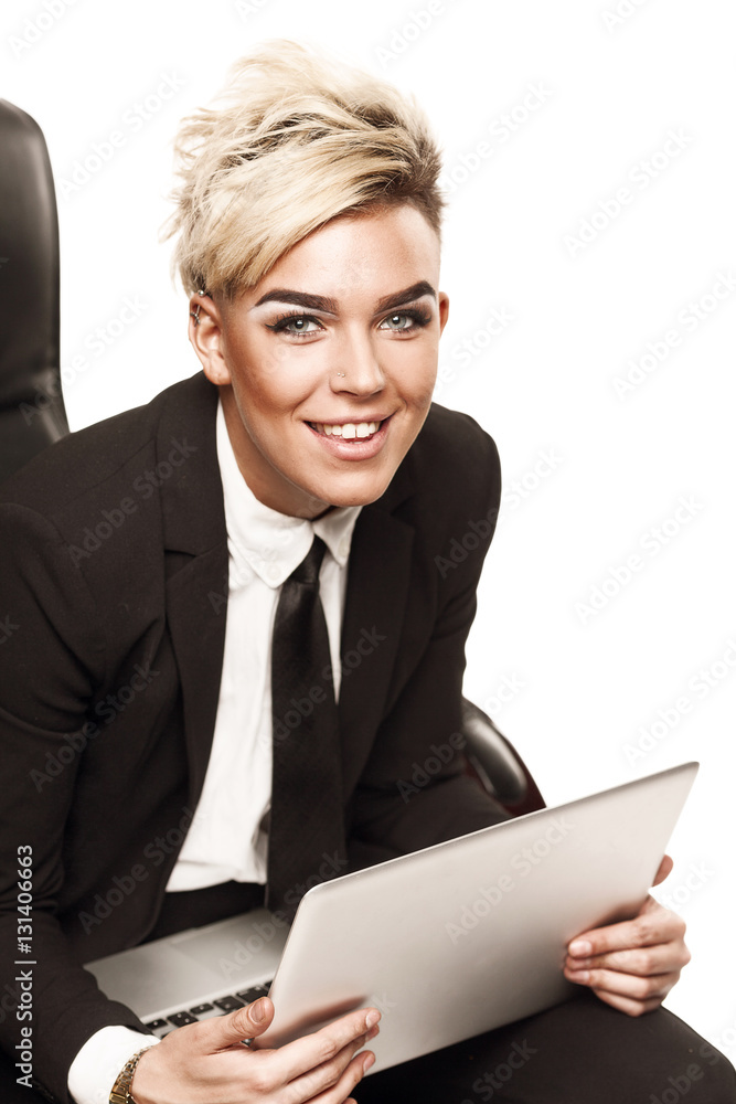 Blond beautiful business lady in black suit Blond beautiful business lady in black suit