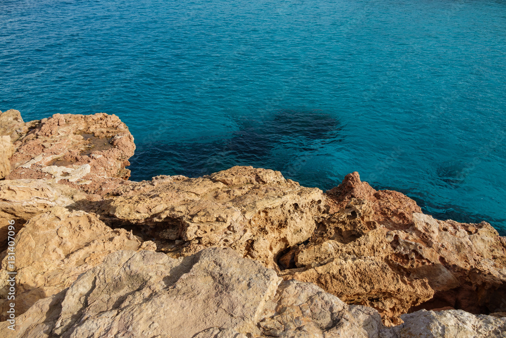 Clear sea water and rocks in the coast Clear sea water and rocks in the coast