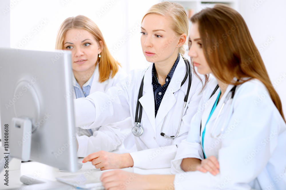 Female doctor leading a medical team at the hospital Female doctor leading a medical team at the hospital