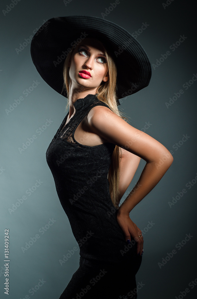 romantic girl in a hat with a wide brim romantic girl in a hat with a wide brim