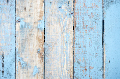 texture of wooden planks painted in blue © monochromst