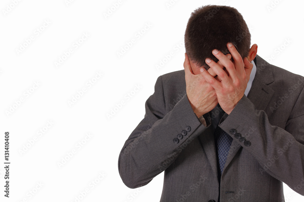 Stressed business man suffering from a headache isolated on white background Stressed business man suffering from a headache isolated on white background