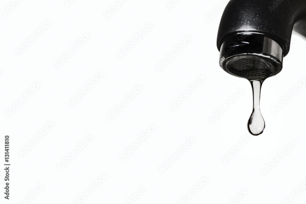last drop from tap, isolated on white background last drop from tap, isolated on white background