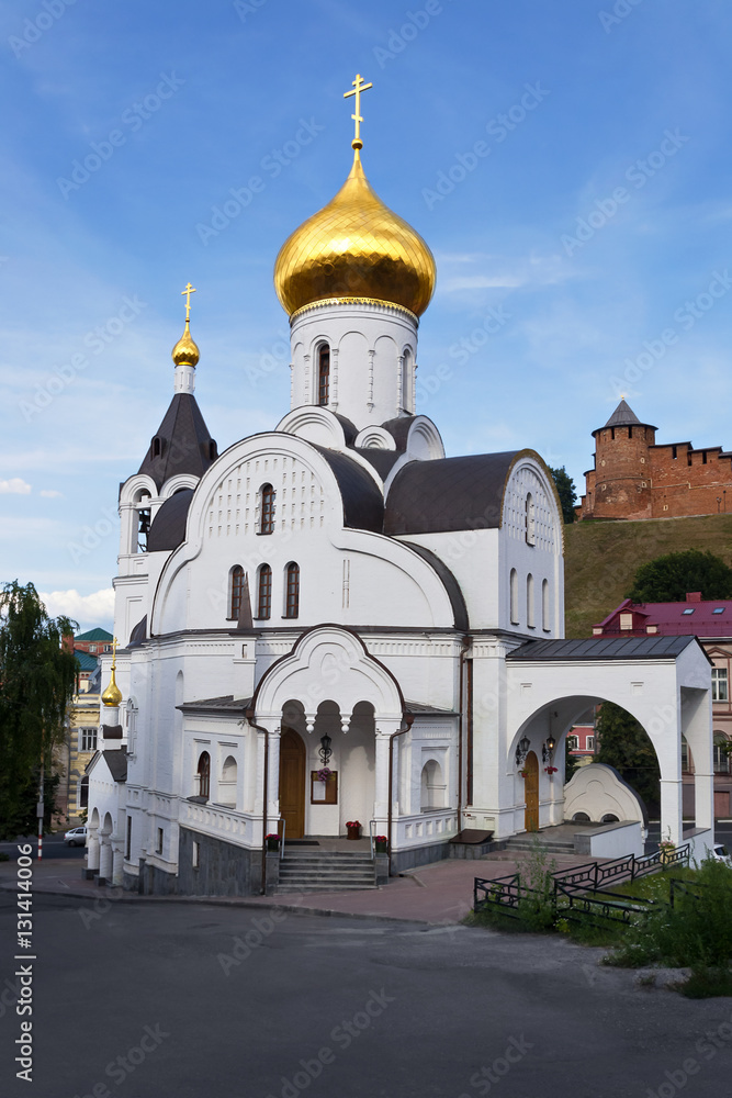 Old church amid Kremlin towers in Nizhny Novgorod