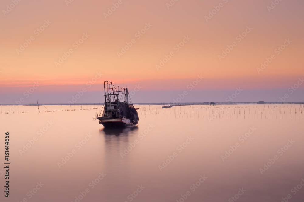 Fishing boat and sunset