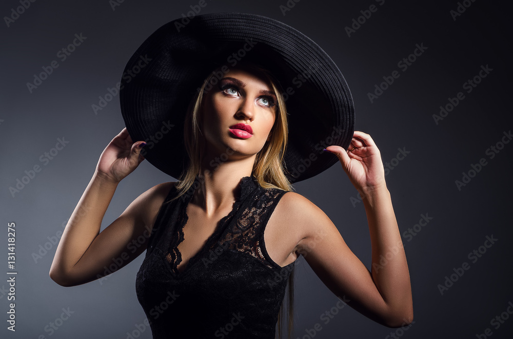 romantic girl in a hat with a wide brim romantic girl in a hat with a wide brim