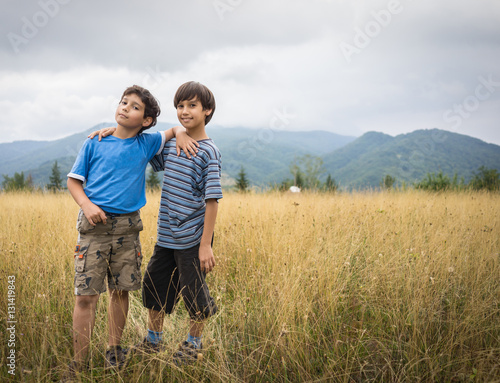 Happy kids in nature enjoying