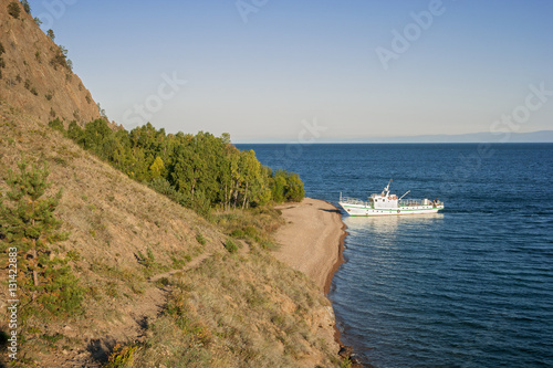 White boat on the lake photo