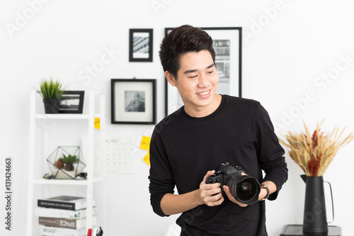 Young Asian photographer