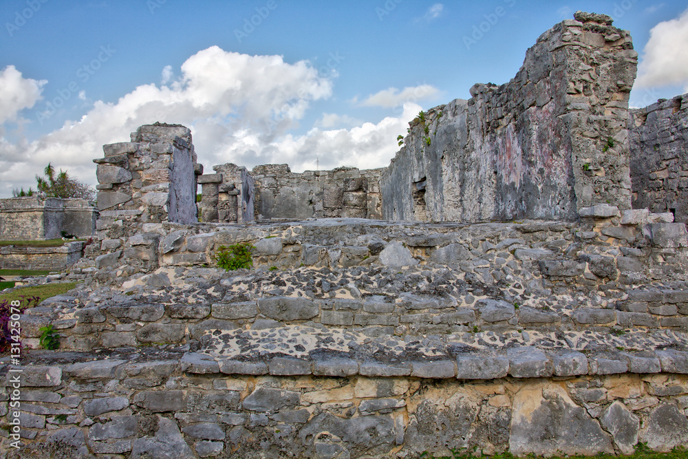 The Mayan ruins in Tulum, Mexico. The ruins were built on tall cliffs on the Caribbean Sea. Tulum was one of the last cities built and inhabited by the Maya.