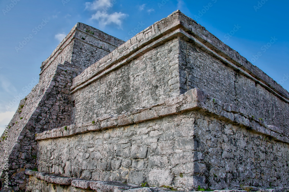 Pyramid El Castillo, The Castle, from the Mayan ruins in Tulum, Mexico. The ruins were built on tall cliffs on the Caribbean Sea. Tulum was one of the last cities built and inhabited by the Maya.